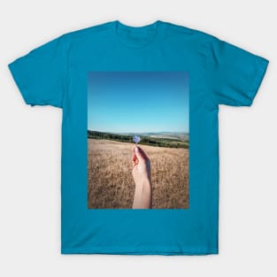 hand holding a chicory flower T-Shirt